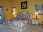 King Size Bed in Master Bedroom with night Stands & Lamps